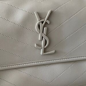 Designer vintage leather shoulder bag in good condition